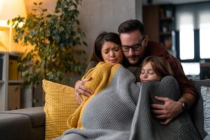 Why Isn’t My Furnace Heating My Entire Home? Family freezing at home because of an expensive heating during cold winter.