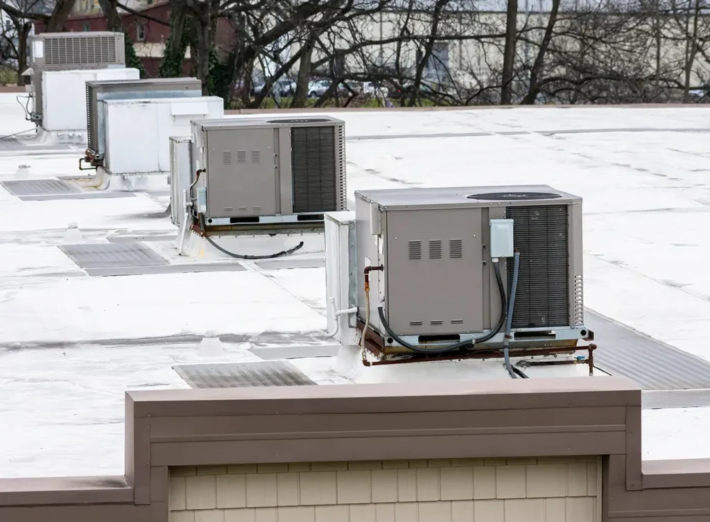 commercial heating and cooling units on top of rooftop of commercial building springfield il