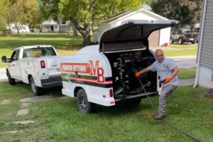 Jason O. of MB Heating & Cooling, Plumbing & Electric – utilizing a sewer jetter truck in Springfield, IL